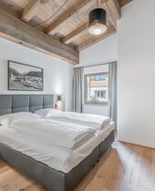 Schlafzimmer im Alpina Seefeld