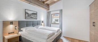 Schlafzimmer im Alpina Seefeld