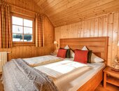 Schlafzimmer in der Hagan Lodge Altaussee