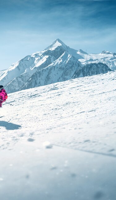 Familie beim Skifahren am Kitzsteinhorn im Winter